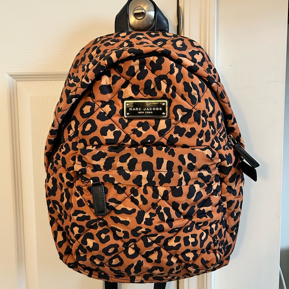 Marc Jacob’s cheetah print backpack.  Used in excellent condition.